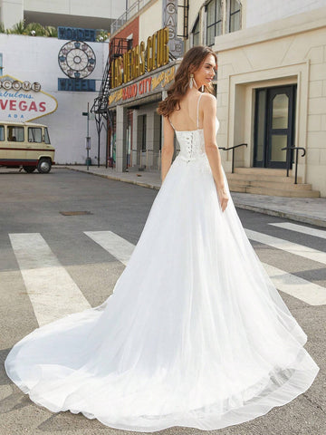 Lace Stitched Floor-Length Wedding Dress With Large Hemline And Spaghetti Straps