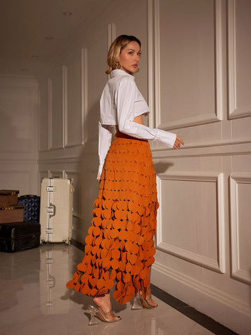 Nyx Circle Cutout Fringe Skirt In Orange