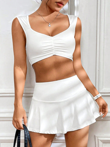 Women'S Cropped Pleated Top And Skorts Set